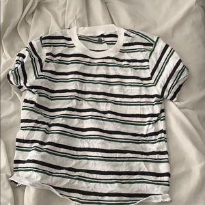 White with green and black striped shirt